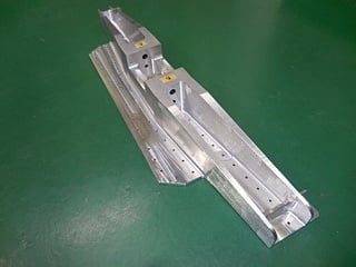 Aluminum part drilled with an angle head machine
